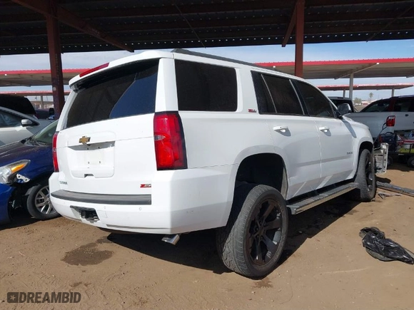 2016 Chevrolet Tahoe LT with VIN 1GNSKBKC5GR241653, listed as a IAAI auction lot 41546699 with 151,862 mi miles. Bid and sale history available at carsss.com. Image 4.