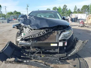 2016 Kia Optima EX with VIN 5XXGU4L3XGG033323, listed as a IAAI auction lot 42088998 with 134,686 mi miles and . Bid and sale history available at carsss.com. Image 12.