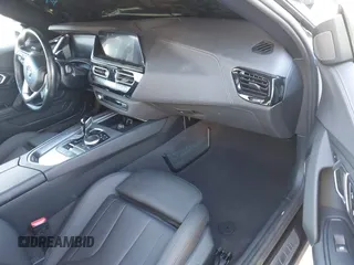 2023 BMW Z4 sDrive30i with VIN WBAHF3C00PWY17214, listed as a IAAI auction lot 41289705 with 3,412 mi miles. Bid and sale history available at carsss.com. Image 5.