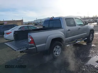 2014 Toyota Tacoma PreRunner with VIN 3TMJU4GN0EM163253, listed as a IAAI auction lot 41559780 with 155,883 mi miles. Bid and sale history available at carsss.com. Image 4.