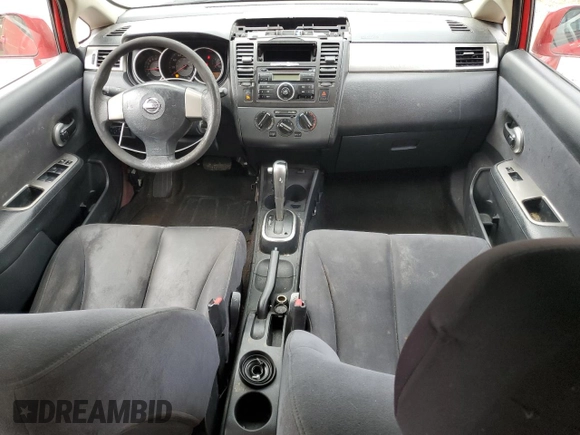 2007 Nissan Versa S z VIN 3N1BC13E27L446857, wystawiony jako Copart lot #54938895 z przebiegiem 243 248 mil mil oraz Szkoda całkowita • Salvage title. Historia ofert i sprzedaży dostępna na DreamBid. Obrazek 8.