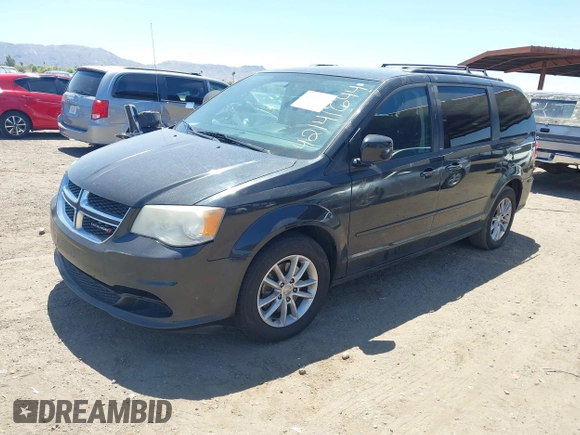 2014 Dodge Grand Caravan SXT with VIN 2C4RDGCG7ER265931, listed as a IAAI auction lot 42141644 with 205,968 mi miles and . Bid and sale history available at DreamBid. Image 2.