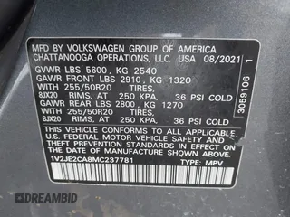 2021 Volkswagen Atlas SE z VIN 1V2JE2CA8MC237781, wystawiony jako IAAI lot #42404797 z przebiegiem Nie podano mil oraz . Historia ofert i sprzedaży dostępna na DreamBid. Obrazek 9.