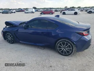 2023 Toyota GR86 with VIN JF1ZNBC16P8751064, listed as a Copart auction lot 74064514 with 16,635 mi miles and Salvage Title. Bid and sale history available at carsss.com. Image 2.