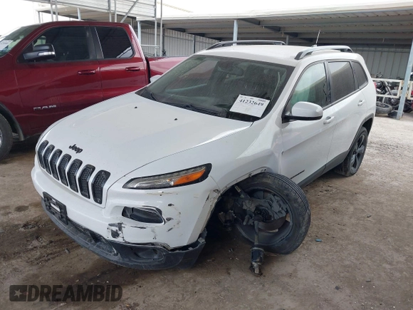 2016 Jeep Cherokee Latitude with VIN 1C4PJLCB5GW207159, listed as a IAAI auction lot 41232649 with 103,991 mi miles. Bid and sale history available at carsss.com. Image 2.