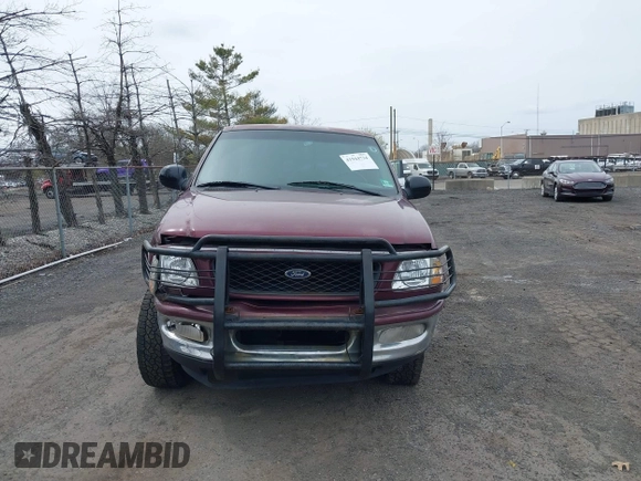 1998 Ford F-150 XL with VIN 1FTDX18W9WKA01690, listed as a IAAI auction lot 41944734 with 176,359 mi miles. Bid and sale history available at carsss.com. Image 12.