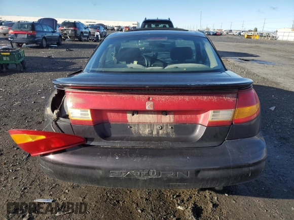 2000 Saturn SC with VIN 1G8ZY1273YZ152453, listed as a Copart auction lot 84834784 with Not Provided miles and Salvage Title. Bid and sale history available at carsss.com. Image 6.