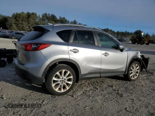 2014 Mazda CX-5 Grand Touring with VIN JM3KE4DY2E0360872, listed as a Copart auction lot 41597495 with 152,412 mi miles and Clean Title. Bid and sale history available at carsss.com. Image 3.