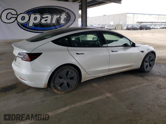 2022 Tesla Model 3 Long Range with VIN 5YJ3E1EB2NF267485, listed as a Copart auction lot 54952505 with 30,569 mi miles and Clean Title. Bid and sale history available at DreamBid. Image 3.