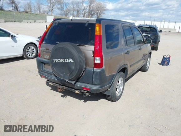 2004 Honda CR-V EX with VIN JHLRD78874C005539, listed as a IAAI auction lot 42013679 with 146,734 mi miles and . Bid and sale history available at carsss.com. Image 4.