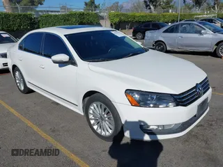 2015 Volkswagen Passat 1.8T SE w/Sunroof & Nav with VIN 1VWBT7A3XFC075648, listed as a IAAI auction lot 40808040 with 189,620 mi miles. Bid and sale history available at carsss.com. Image 1.