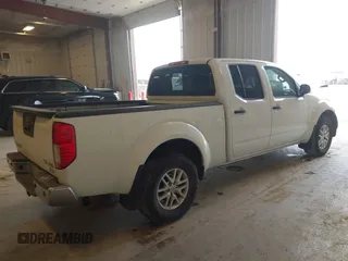 2018 Nissan Frontier SV z VIN 1N6DD0FV7JN718221, wystawiony jako IAAI lot #42118492 z przebiegiem 132 413 mil mil oraz . Historia ofert i sprzedaży dostępna na DreamBid. Obrazek 4.