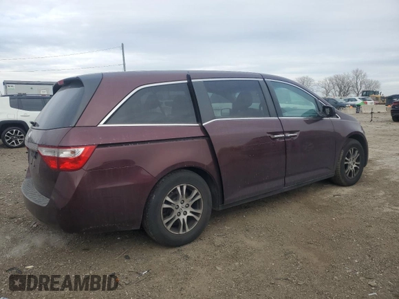 2011 Honda Odyssey EX-L with VIN 5FNRL5H69BB057080, listed as a Copart auction lot 41984785 with 152,963 mi miles and Salvage Title. Bid and sale history available at DreamBid. Image 3.