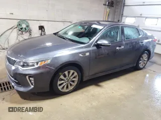 2018 Kia Optima S with VIN 5XXGT4L38JG205696, listed as a Copart auction lot 59052095 with 92,859 mi miles and Salvage title. Bid and sale history available at DreamBid. Image 1.