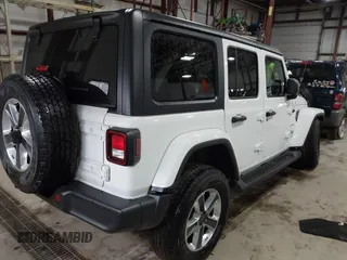 2021 Jeep Wrangler Unlimited Sahara with VIN 1C4HJXEG2MW655357, listed as a IAAI auction lot 41724695 with 37,644 mi miles and . Bid and sale history available at DreamBid. Image 4.