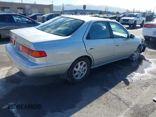 2001 Toyota Camry LE z VIN JT2BF22KX10342454, wystawiony jako IAAI lot #41939743 z przebiegiem 124 045 mil mil oraz . Historia ofert i sprzedaży dostępna na DreamBid. Obrazek 4.