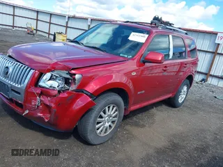 2008 Mercury Mariner Premier with VIN 4M2CU97178KJ00739, listed as a IAAI auction lot 42312408 with 167,591 mi miles and . Bid and sale history available at DreamBid. Image 2.
