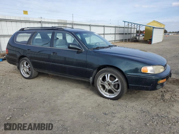 1995 Toyota Camry LE z VIN 4T1GK12W4SU079938, wystawiony jako Copart lot #77065084 z przebiegiem 222 731 mil mil oraz Szkoda całkowita • Salvage title. Historia ofert i sprzedaży dostępna na DreamBid. Obrazek 4.