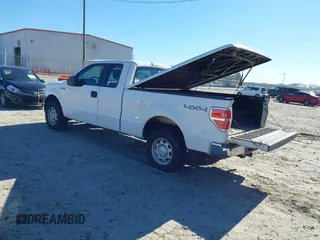 2014 Ford F-150 XL with VIN 1FTFX1EF0EKF01068, listed as a IAAI auction lot 41641910 with 212,728 mi miles. Bid and sale history available at carsss.com. Image 3.