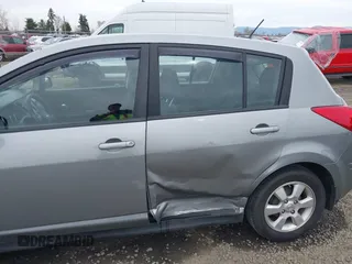 2012 Nissan Versa S with VIN 3N1BC1CP1CK807948, listed as a IAAI auction lot 41772063 with 87,126 mi miles. Bid and sale history available at carsss.com. Image 6.