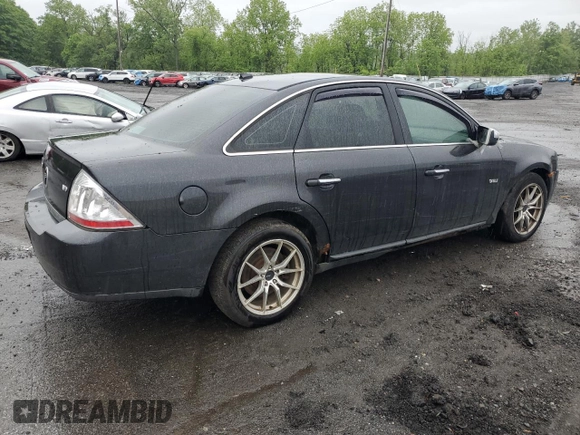 2008 Mercury Sable Premier z VIN 1MEHM43W98G604677, wystawiony jako Copart lot #57840985 z przebiegiem 171 695 mil mil oraz Szkoda całkowita • Salvage title. Historia ofert i sprzedaży dostępna na DreamBid. Obrazek 3.