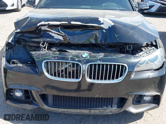 2014 BMW 5 Series 535d with VIN WBAXA5C58ED690447, listed as a IAAI auction lot 41577468 with 149,080 mi miles and . Bid and sale history available at carsss.com. Image 6.