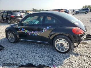 2012 Volkswagen Beetle 2.5L with VIN 3VWJX7AT1CM629184, listed as a Copart auction lot 70026624 with 114,578 mi miles and Clean Title. Bid and sale history available at carsss.com. Image 2.