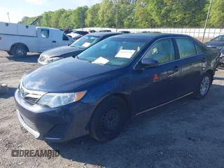 2014 Toyota Camry L with VIN 4T1BF1FK3EU820882, listed as a IAAI auction lot 42012278 with 174,000 mi miles and . Bid and sale history available at DreamBid. Image 19.