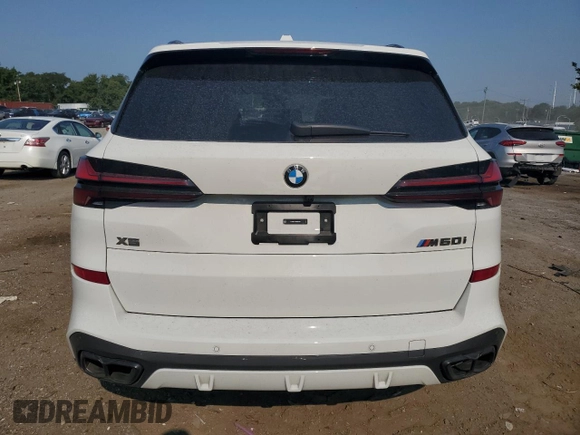 2024 BMW X5 M60i with VIN 5UX33EU04R9U00310, listed as a Copart auction lot 65352824 with 16,088 mi miles and Salvage Title. Bid and sale history available at carsss.com. Image 6.