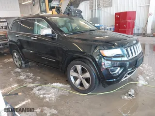 2014 Jeep Grand Cherokee Overland with VIN 1C4RJFCT7EC187319, listed as a IAAI auction lot 41256107 with 98,287 mi miles. Bid and sale history available at carsss.com. Image 1.