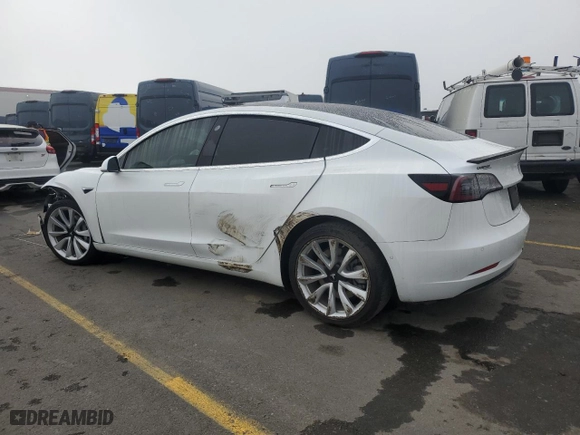 2020 Tesla Model 3 Standard Range Plus with VIN 5YJ3E1EA9LF661618, listed as a Copart auction lot 85731934 with NaN miles and Salvage Title. Bid and sale history available at carsss.com. Image 2.
