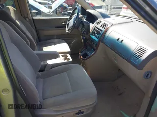 2003 Kia Sedona LX with VIN KNDUP131536414349, listed as a IAAI auction lot 41836104 with 70,130 mi miles. Bid and sale history available at carsss.com. Image 5.