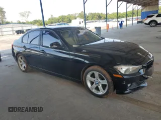2015 BMW 3 Series 328i with VIN WBA3A5G51FNS87379, listed as a Copart auction lot 57752165 with 56,802 mi miles and Salvage title. Bid and sale history available at DreamBid. Image 4.