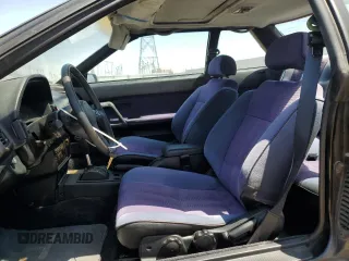 1989 Toyota Celica z VIN JT2ST67C8K7337876, wystawiony jako Copart lot #57918785 z przebiegiem 16 862 mil mil oraz Tytuł czysty. Historia ofert i sprzedaży dostępna na DreamBid. Obrazek 7.