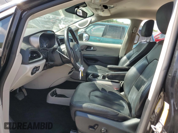 2020 Chrysler Pacifica Touring L with VIN 2C4RC1BG8LR133548, listed as a Copart auction lot 63272655 with 64,489 mi miles and Salvage title. Bid and sale history available at DreamBid. Image 7.