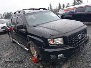 2011 Honda Ridgeline RTS with VIN 5FPYK1F44BB004240, listed as a IAAI auction lot 41248168 with 133,327 mi miles. Bid and sale history available at carsss.com. Image 1.