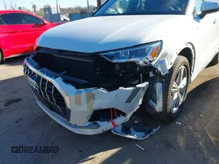 2020 Audi Q3 S line Premium Plus with VIN WA1EECF36L1103748, listed as a IAAI auction lot 41368428 with 21,155 mi miles and . Bid and sale history available at DreamBid. Image 6.