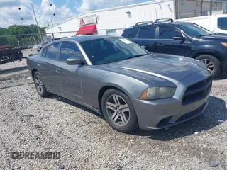 2012 Dodge Charger Police with VIN 2C3CDXAT7CH282743, listed as a IAAI auction lot 42753662 with 202,996 mi miles and . Bid and sale history available at DreamBid. Image 1.