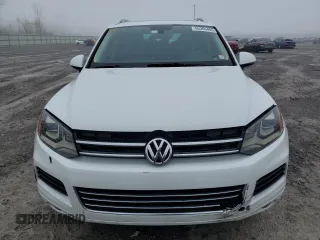 2012 Volkswagen Touareg Sport with VIN WVGEF9BP2CD010668, listed as a Copart auction lot 55306485 with 166,255 mi miles and Clean Title. Bid and sale history available at DreamBid. Image 5.