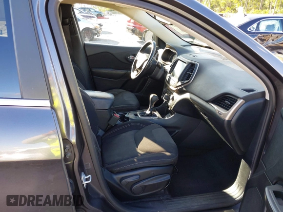 2016 Jeep Cherokee Altitude with VIN 1C4PJLCSXGW363598, listed as a IAAI auction lot 41670125 with 135,603 mi miles. Bid and sale history available at carsss.com. Image 5.