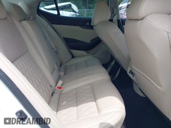2023 Nissan Maxima Platinum z VIN 1N4AA6FV5PC512973, wystawiony jako IAAI lot #42317887 z przebiegiem 8 067 mil mil oraz . Historia ofert i sprzedaży dostępna na DreamBid. Obrazek 8.