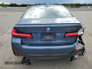 2023 BMW 5 Series M550i xDrive with VIN WBA13BK06PCM31937, listed as a Copart auction lot 66490494 with 24,972 mi miles and Salvage title. Bid and sale history available at DreamBid. Image 6.