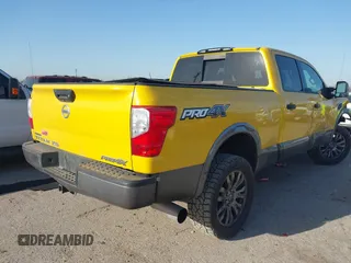2016 Nissan Titan SL z VIN 1N6BA1F48GN500066, wystawiony jako IAAI lot #41857911 z przebiegiem 133 303 mil mil oraz . Historia ofert i sprzedaży dostępna na DreamBid. Obrazek 4.