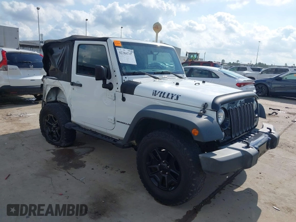 2015 Jeep Wrangler Willys Wheeler with VIN 1C4AJWAG0FL562536, listed as a IAAI auction lot 42384747 with 103,507 mi miles and . Bid and sale history available at DreamBid. Image 1.