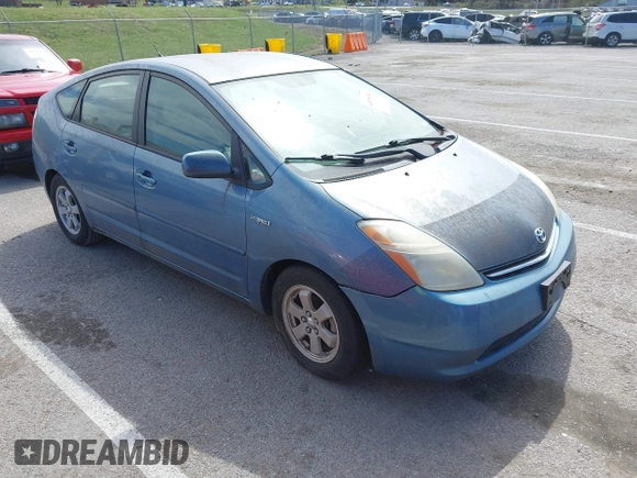2007 Toyota Prius z VIN JTDKB20U677595987, wystawiony jako IAAI lot #41876974 z przebiegiem 218 650 mil mil oraz . Historia ofert i sprzedaży dostępna na DreamBid. Obrazek 1.