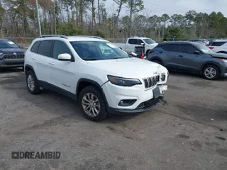 2019 Jeep Cherokee Latitude with VIN 1C4PJMCX0KD336934, listed as a IAAI auction lot 41172828 with 47,477 mi miles. Bid and sale history available at carsss.com. Image 1.