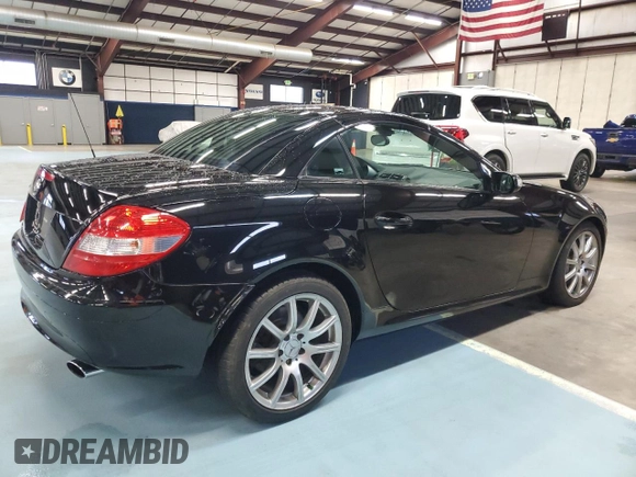 2005 Mercedes-Benz SLK-Class with VIN WDBWK56FX5F049285, listed as a Copart auction lot 73306494 with 94,785 mi miles and Salvage Title. Bid and sale history available at carsss.com. Image 3.