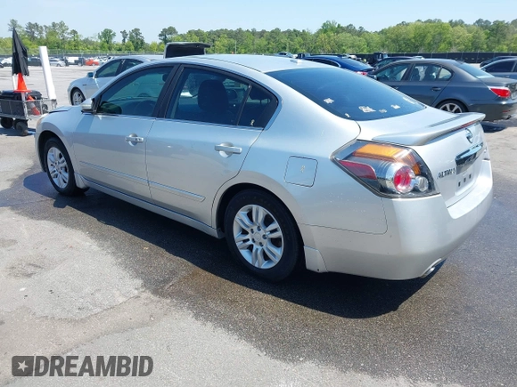 2010 Nissan Altima 2.5 S with VIN 1N4AL2AP5AN513631, listed as a IAAI auction lot 42014908 with 205,798 mi miles. Bid and sale history available at carsss.com. Image 3.