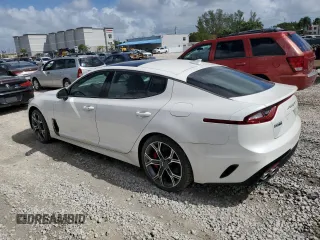 2021 Kia Stinger GT1 with VIN KNAE45LC9M6090262, listed as a Copart auction lot 77339854 with 3,354 mi miles and Salvage Title. Bid and sale history available at carsss.com. Image 2.