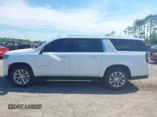 2023 Chevrolet Suburban Premier with VIN 1GNSCFKDXPR371053, listed as a IAAI auction lot 42045193 with 92,544 mi miles and . Bid and sale history available at DreamBid. Image 14.